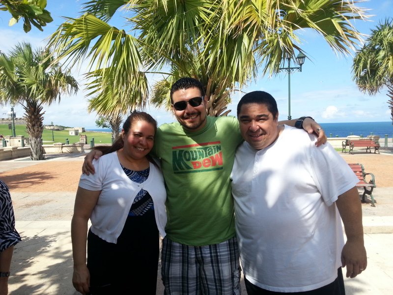 Angel with the family in San Juan
